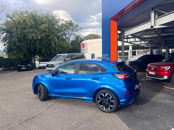 FORD Puma 1.0 Flexifuel 125ch S&S mHEV ST-Line X - Vue 4