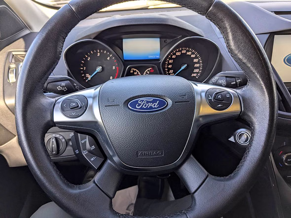 FORD Kuga 2.0 TDCi 150ch Titanium 4x4 PowerShift - Miniature 9