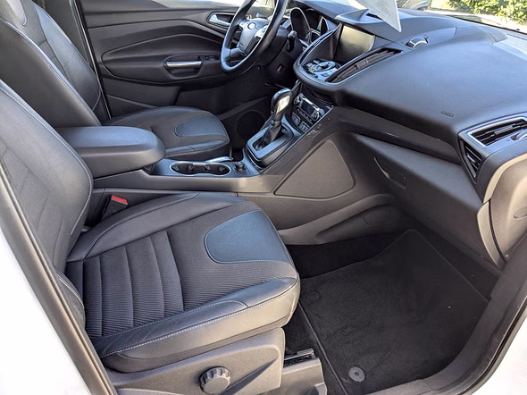 FORD Kuga 2.0 TDCi 150ch Titanium 4x4 PowerShift - Miniature 17