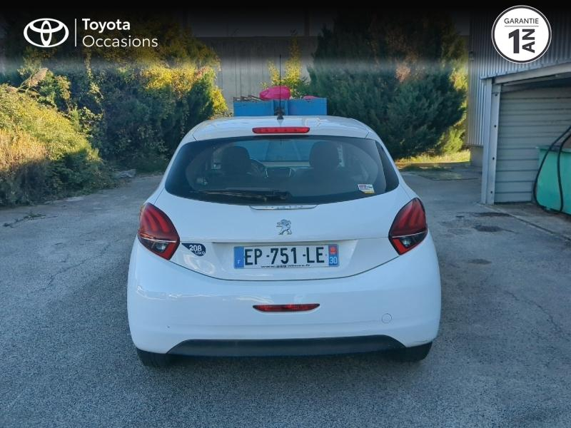 group.seo.links.detann.title Photo 4 de l’annonce de PEUGEOT 208 d’occasion à vendre à NÎMES